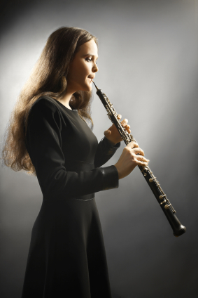 https://www.istockphoto.com/stock-photo-23458127-classical-musician-oboe-musical-instrument-playing.php?st=c3bcc3c